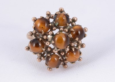 Lot 155 - A 14K gold tigers eye cluster cocktail ring