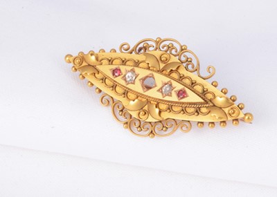 Lot 161 - An antique 15ct gold diamond & ruby set brooch