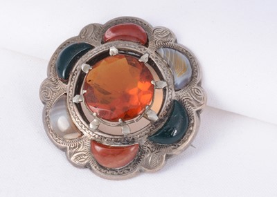Lot 162 - An antique Scottish brooch set with agate &  cairngorm stone