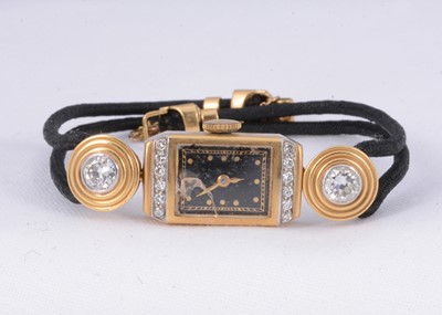 Lot 167 - A 18ct gold & diamond deco style cocktail watch