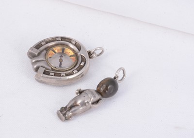 Lot 172 - A Military WW1 silver Fumsup charm & silver horse shoe  compass charm