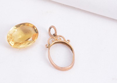 Lot 182 - A 9ct gold Citrine pendant