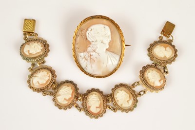 Lot 197 - A seven panel cameo bracelet & antique cameo brooch