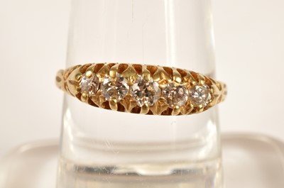 Lot 208 - An antique 18ct gold five stone diamond ring
