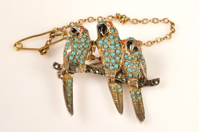 Lot 214 - A German 800 silver triple parrot brooch