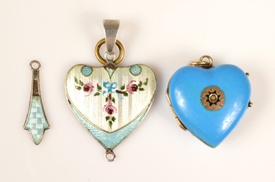 Lot 220 - A yellow metal blue enamel heart locket & enamel heart with drop