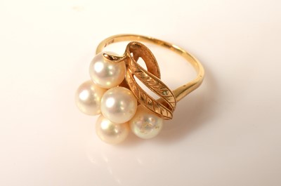 Lot 238 - An Tasaki 18k gold cultured pearl cluster ring