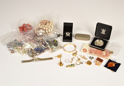 Lot 243 - A 9ct rolled gold bracelet, silver £5 coin year 2000 in box & a large collection of beaded stone jewellery