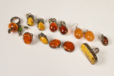 Lot 249 - Three continental silver & amber dress rings & collection of amber earrings