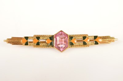 Lot 251 - A yellow metal enamel & pink gem set bar brooch