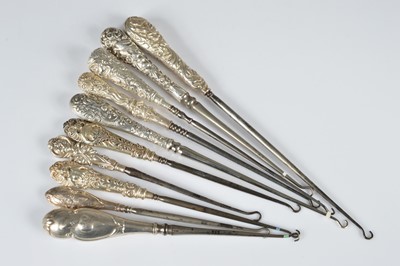 Lot 263 - A collection of ten silver handled button hooks