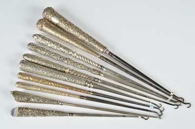 Lot 266 - A collection of ten silver handled button hooks
