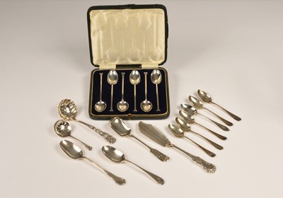 Lot 298 - A collection of silver spoons and a butter knife