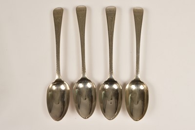 Lot 302 - A set of four George III silver tablespoons