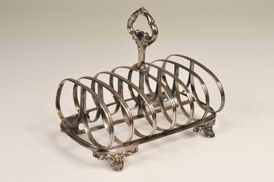 Lot 313 - A Victorian silver toast rack by JE