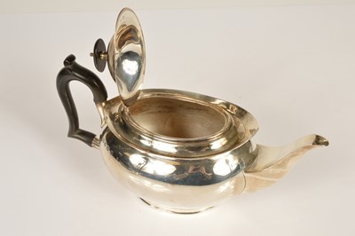 Lot 373 - A George V silver teapot and sugar basin by William Hutton and Sons