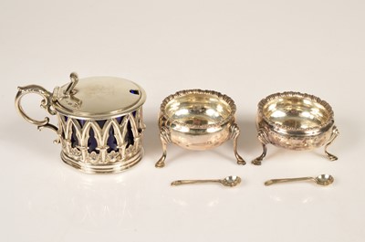 Lot 385 - A George III silver mustard together with a pair of George III silver cauldron salts