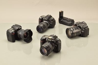 Lot 106 - Four Nikon DSLR Cameras