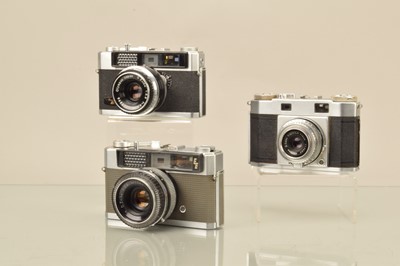 Lot 156 - Three Olympus 35mm Cameras