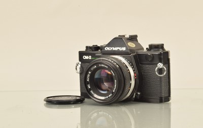 Lot 277 - An Olympus OM-2 Spot/Program SLR Camera