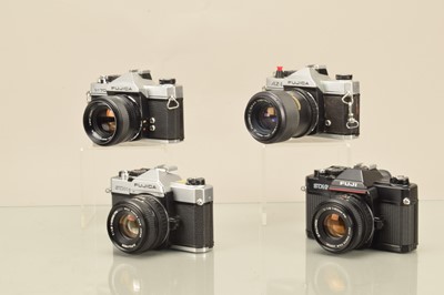 Lot 282 - Four Fujica SLR Cameras