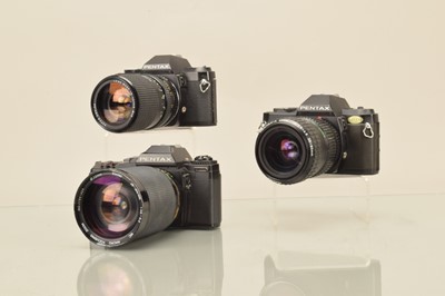 Lot 334 - Three Pentax SLR Cameras