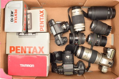 Lot 335 - Three Pentax SLR Cameras