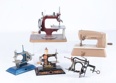 Lot 124 - Five child's sewing machines