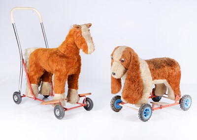 Lot 133 - Two ride-on/push along soft toy animals