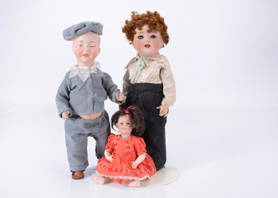 Lot 154 - Three character bisque headed baby doll