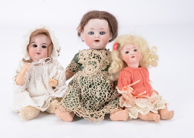 Lot 158 - Three small baby dolls