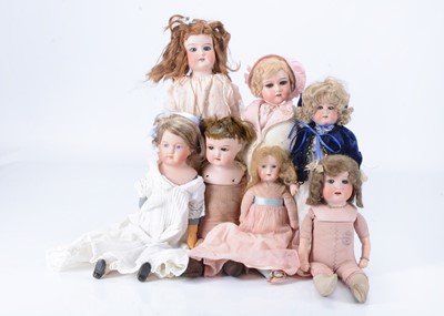Lot 160 - Six bisque headed dolls on cloth bodies