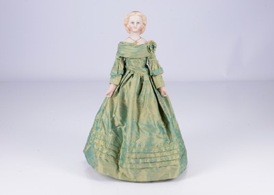 Lot 174 - A fine quality reproduction bisque shoulder-head doll