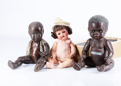 Lot 198 - Two black character baby dolls