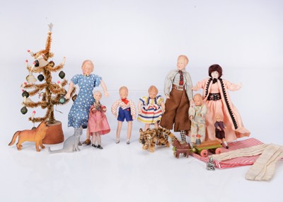 Lot 227 - A set of Caco family dolls' house dolls