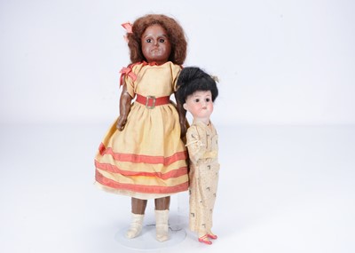 Lot 276 - A German bisque headed brown child doll