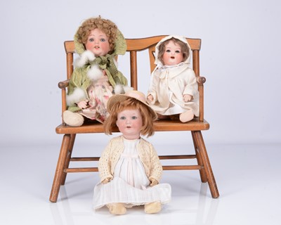 Lot 281 - Three bisque headed character babies