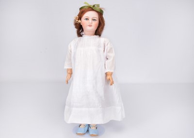 Lot 282 - An Unis 301 bisque headed child doll