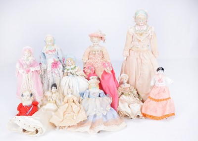 Lot 300 - A quantity of shoulder headed dolls