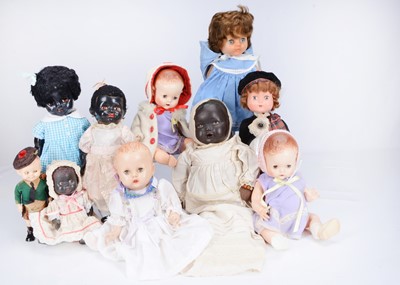 Lot 304 - Various hard plastic dolls