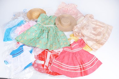 Lot 308 - A quantity of medium to large dolls clothes