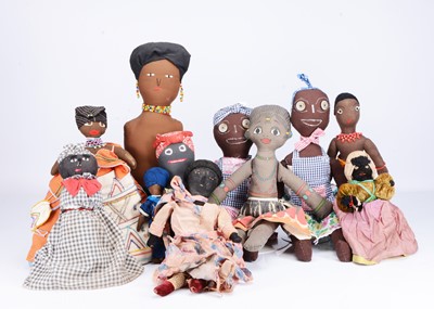 Lot 310 - A collection of black cloth and felt dolls