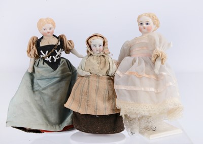 Lot 356 - Three 19th century German shoulder head dolls