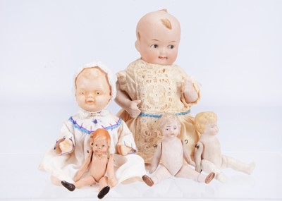 Lot 378 - Five small dolls