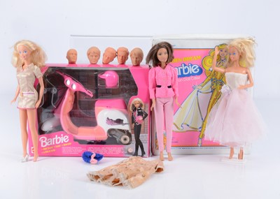 Lot 422 - Three Mattel  modern Barbie dolls and accessories