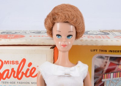 Lot 424 - A Mattel Miss Barbie with lawn swing set 1964