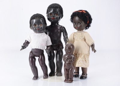 Lot 499 - Four black dolls