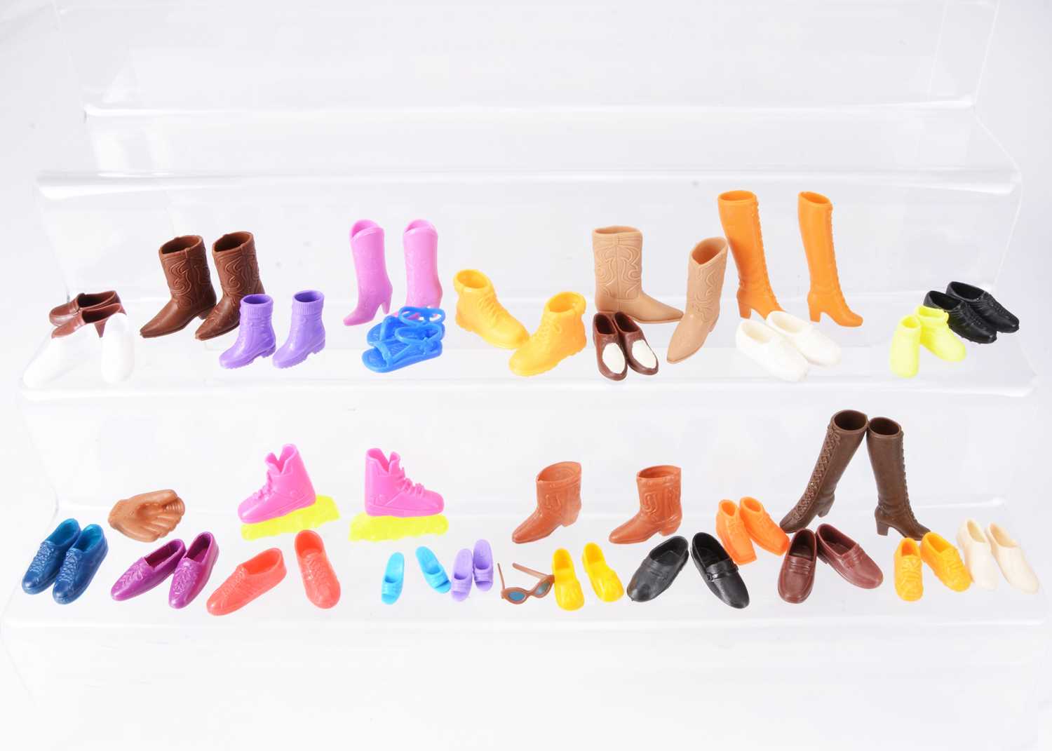 Lot 516 - A very large selection of plastic shoes