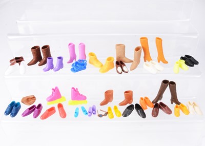 Lot 516 - A very large selection of plastic shoes
