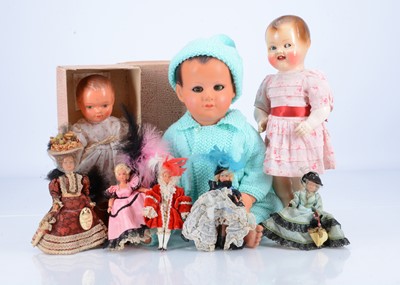Lot 521 - Seven French celluloid dolls